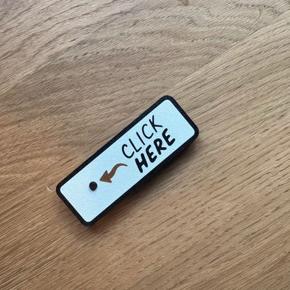 LOVILDS™The "Click Here" Surprise Button - Hilarious Prank Toy