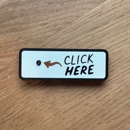 LOVILDS™The "Click Here" Surprise Button - Hilarious Prank Toy